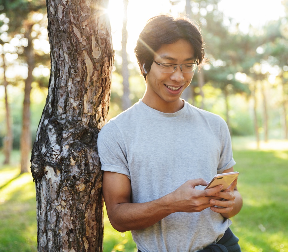 Young man viewing phone
