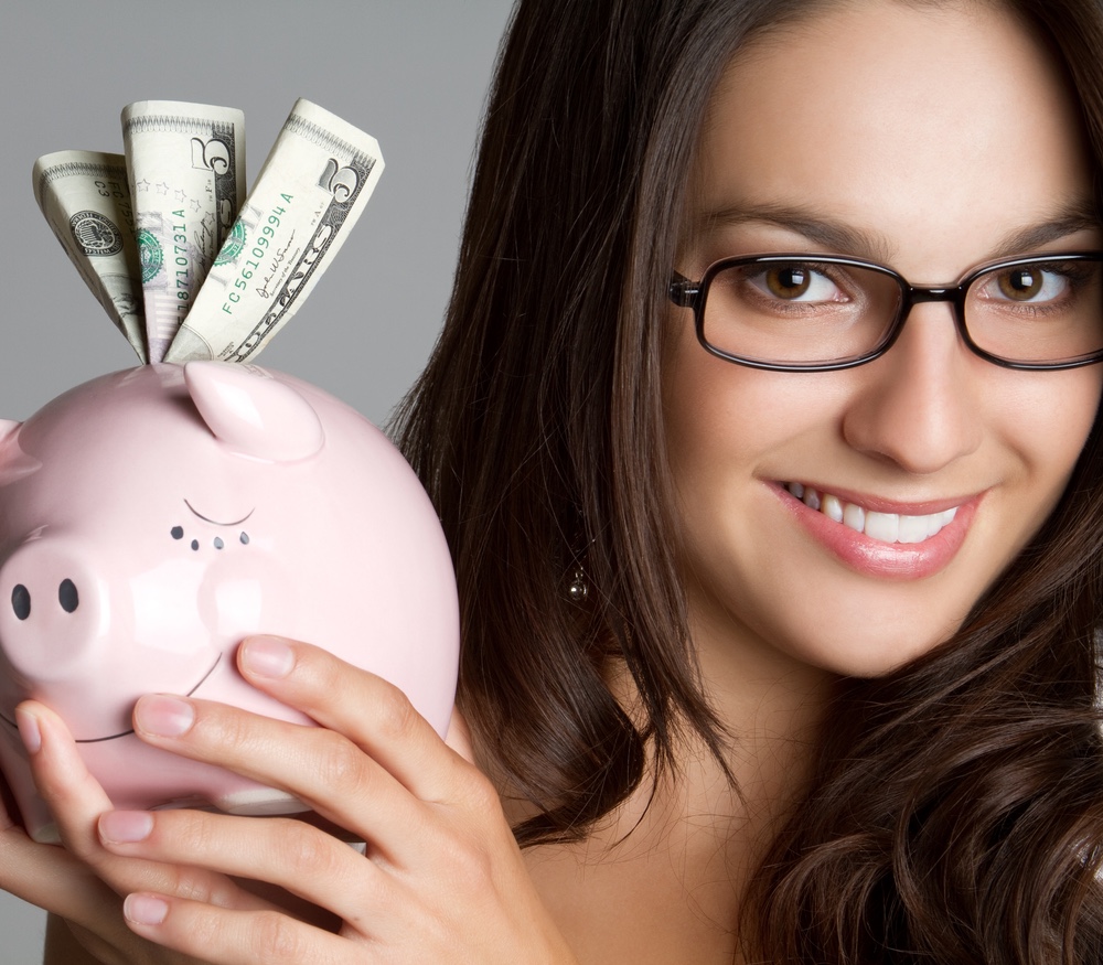 Woman with piggy bank